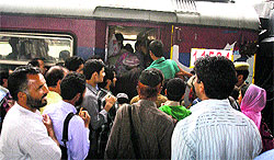 People board a train to Banihal on Thursday