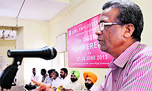 An office-bearer addresses the district conference of the BSNL Employees Union, Ludhiana, on Thursday