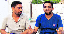 A survivor (right) shares his ordeal