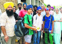 Sri Hemkund Sahib pilgrims being greeted in Muktsar on Wednesday. 
