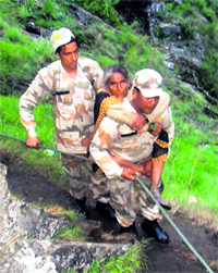 ITBP jawans rescue a woman near Badrinath on Friday.