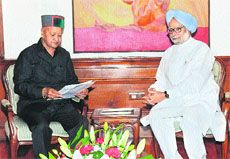 Chief Minister Virbhadra Singh with Prime Minister Manmohan Singh in New Delhi on Friday.