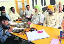 Patients await their turn at the ECHS Polyclinic, Nawanshahr. 
