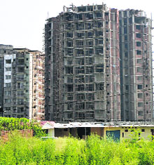 Under construction high-rise residential buildings at Akhnoor Road in Jammu. 
