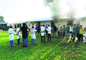 Children participate in a street play organised by the Army to make people aware of traffic rules and road safety in Rajouri district on Thursday. 