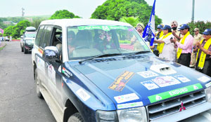 Minister for Higher Education Mohd Akbar Lone flags off Mughal Road car rally in Jammu on Friday. 