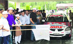 Minister of State for Home Sajjad Ahmad Kichloo flags off the four-day Mughal Motor Rally in Srinagar on Friday. Tribune photo: Anand Sharma 