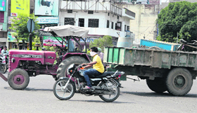 Despite ban, a tractor-trailier being used for commercial purposes at Model Town in Jalandhar.