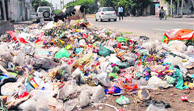 Garbage piles up near BSF Chowk in Jalandhar.