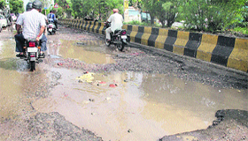 Ladowali Road develops big potholes in Jalandhar.