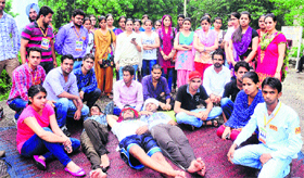 MSc students hold a protest in front of the administrative block of Panjab University in Chandigarh.