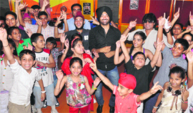 Participants having a good time with Punjabi singer Gurkirpal Surapuri during the closing ceremony of a summer dance camp at Dance Studio, Phase X, Mohali, on Saturday.