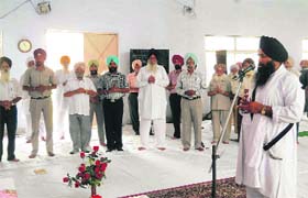 Sikh devotees offer ardas at Guru Nanak Academy at BHEL in Haridwar on Saturday
