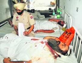 Injured Jagjit Singh and Major Singh at a Faridkot hospital on Saturday.