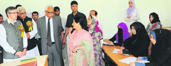 Chief Minister Omar Abdullah, Union minister Salman Khurshid and Governor NN Vohra at the University of Kashmir in Srinagar on Saturday.