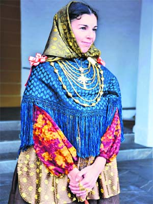 A Spanish girl in a traditional costume