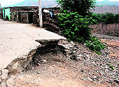A portion of a road that caved in following a downpour in Bir Ghaggar