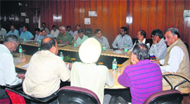 Uttarakhand Chief Minister Vijay Bahuguna chairs a meeting of senior officials on prevailing situation in the state at the Secretariat on Sunday