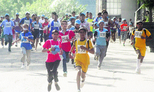 Participants take part in a marathon for International Day against Drug Abuse in Shimla on Sunday.