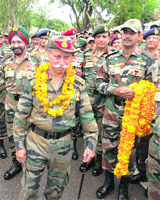 GOC-in-C of the Northern Command Lt Gen KT Parnaik during his farewell in Udhampur on Sunday.