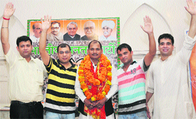 BJYM national in charge Ashok Chauhan (centre) during a meeting of state party workers in Jammu on Sunday.