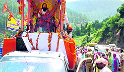 A religious procession being taken out by the devotees on the 636th Parkash Divas of Guru Ravi Das in Batote on Sunday