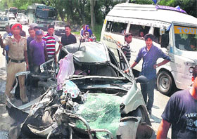 The mangled remains of the car that collided head-on with a canter, killing two members of a family and leaving four others seriously injured on the Jalandhar-Chandigarh highway in Behram village near Banga on Sunday. 