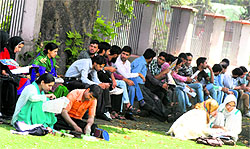 Aspirants for the National Eligibility Test prepare for part II of the test at Partap Park in Srinagar on Sunday
