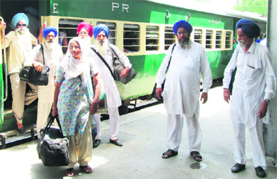 Jatha members arrive at the Attari railway station on Sunday after observing the death anniversary of Maharaja Ranjit Singh in Pakistan. 