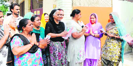  Supporters of a panchayat poll candidate canvass at Ranjit Vihar in Amritsar on Sunday. The elections are to be held on July 3.