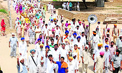 Residents of village Siviyan campaign for the panchayat elections on Monday