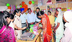 Assistant Superintendent of Police (Traffic) Alka Meena inaugurating the Mahila Karyana Store in village Behman Diwana on Monday