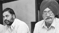 Swaran Singh (right), father of IPL cricketer Manpreet Goni, addresses a press conference at Phase V in Mohali on Monday.Tribune photo