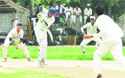 A batsman hits the ball during a cricket match in the ongoing North Zone Cricket Tournament at Vivek High School, Sector 38, in Chandigarh on Monday. Tribune photo