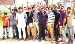 Students of Aggarsen Senior Secondary School, Raipur Rani, stage a protest on Monday. A Tribune photograph