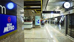 A logo of the Delhi Metro put on the wall at the Shivaji Stadium of the Airport Express Line