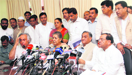 Union Rural Development Minister Jairam Ramesh, Congress general secretary Ambika Soni and Chief Minister Vijay Bahuguna address a press conference in Dehradun on Monday.