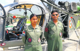 Squadron Leader Khushboo Gupta and Squadron Leader Vipin Takawale beside their Cheetah helicopter at the Gauchar helipad near Uttarkashi.