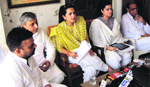 MP Shruti Choudhry (second from right) and state Minister for Public Health Engineering, Excise and Taxation Kiran Choudhry address mediapersons at Bhiwani on Monday. 