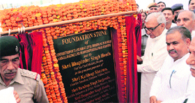 Haryana CM Bhupinder Singh Hooda lays the foundation stone of a railway overbridge at a level crossing on the Delhi-Ambala railway track in Sonepat.