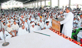 Yash Pal Malik, national president, Akhil Bharatiya Jat Arakshan Sangharsh Samiti, addresses khap representatives in a Mahapanchayat at Sonepat.