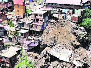 The Krishna Nagar locality in Shimla where houses collapsed due to heavy rain, on Monday. 