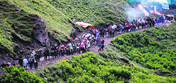 Pilgrims on their way to the Amarnath cave shrine from the Pahalgam base camp on Monday.