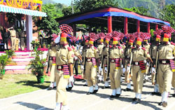 DGP Ashok Prasad takes the salute during the passing out parade of the 11th batch from Police Training Centre at Talwara on Monday. A Tribune photograph