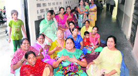 Residents of Central Town, Jalandhar, stage a dharna in front of the office of the Deputy Commissioner on Monday. They were protesting against the shifting of the dispensary from their area by the District Health Department.