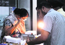 A fingerprint expert examines the site where the theft took place at Gill road in Ludhiana. 
