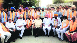 Akali Dal supporters who joined the Congress in Payal on Monday. 