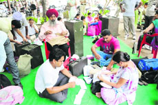 Polling staff checks the election material supplied to them in Bathinda on the eve of the panchayat elections on Tuesday. 
