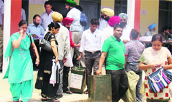 Polling staff leave with election material for the panchyat elections in Fatehgarh Sahib on Tuesday.