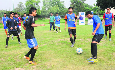 Soccer players take part in the Bajaj Allianz Soccer Talent Hunt trials at St Soldier School, Sector 28, in Chandigarh on Tuesday.